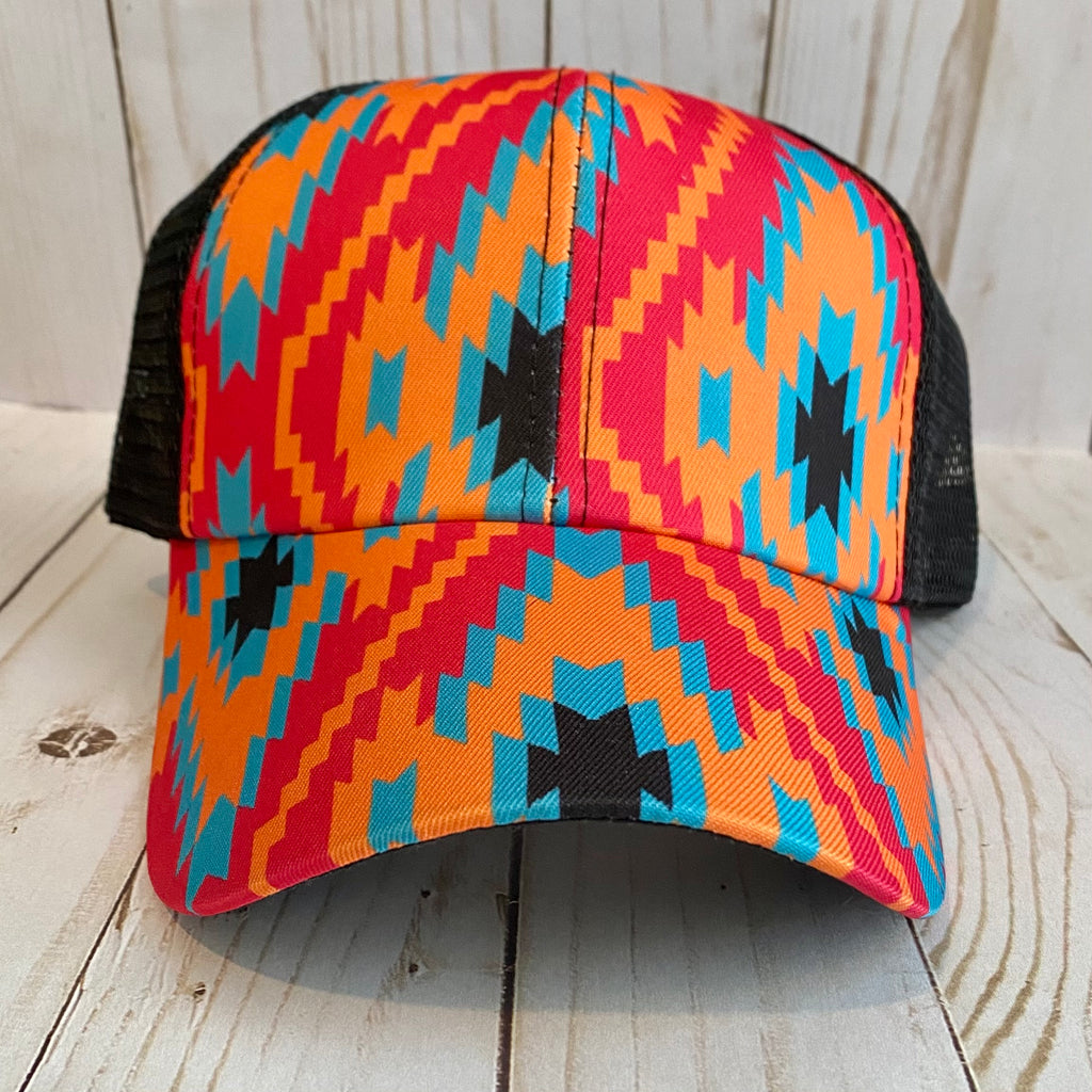 Coral Aztec Print Distressed Criss Cross Ponytail Hat